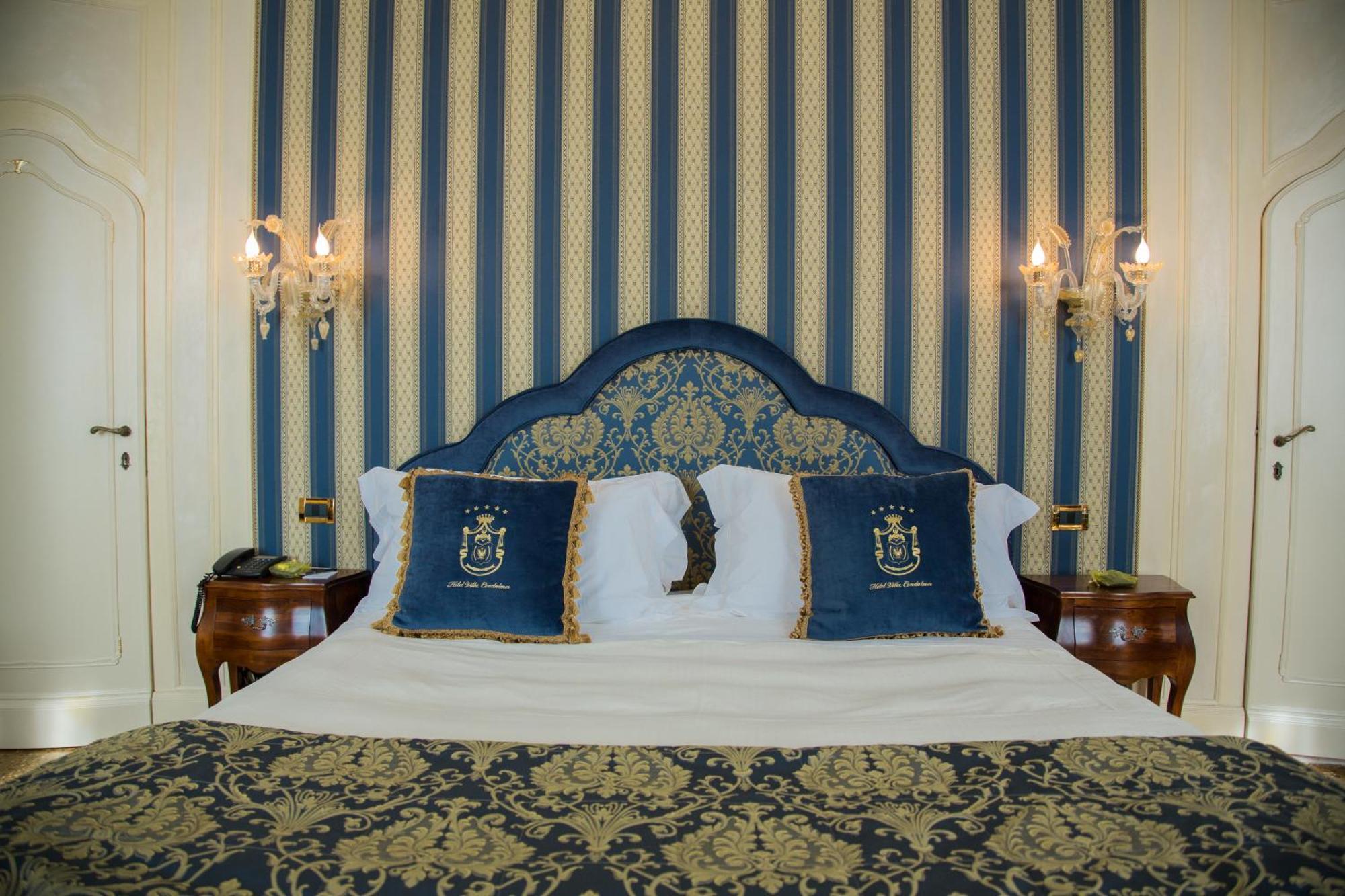 Hotel Villa Condulmer Mogliano Veneto Ruang foto A bedroom at the hotel